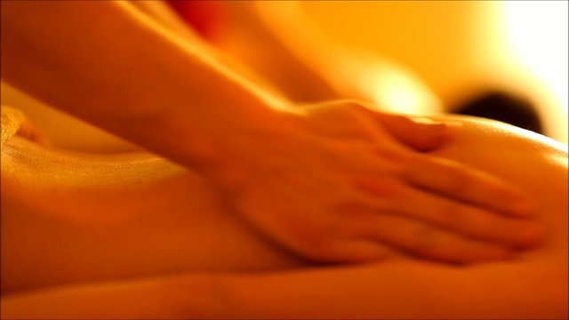 Massage for couple in the warm atmosphere of the salon