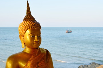 golden Buddha at the sea