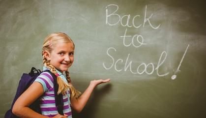 Portrait of cute little girl in classroom