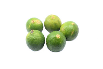 green limes isolated on white background