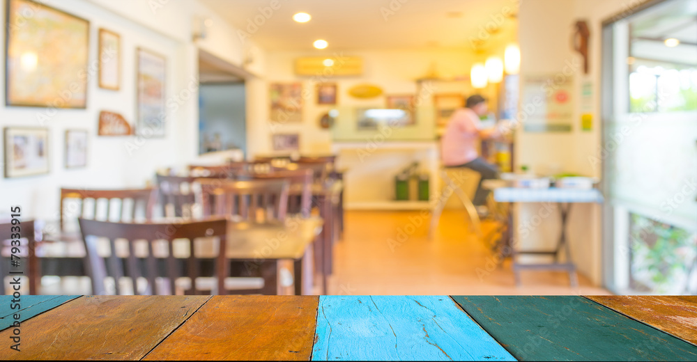 Wall mural Coffee shop blur background with bokeh