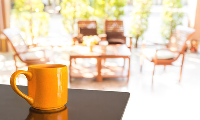 Empty wood table and Coffee shop blur background with bokeh imag
