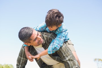 Fototapeta premium Father and son in the countryside