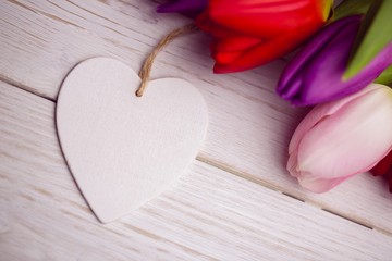 Obraz na płótnie Canvas Bunch of tulips and heart card
