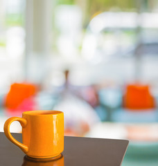 Empty wood table and Coffee shop blur background with bokeh imag