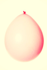 Pink balloon.