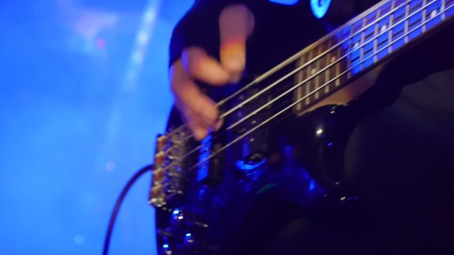 guitarist in live action - live concert - closeup shot