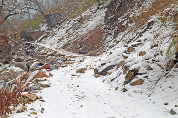 hiking road with snow in mountain