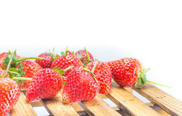 fresh strawberry on wood table isolated on white background.