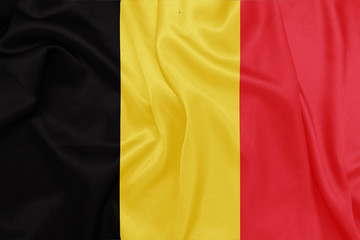 Fototapeta premium Belgium - Waving national flag on silk texture