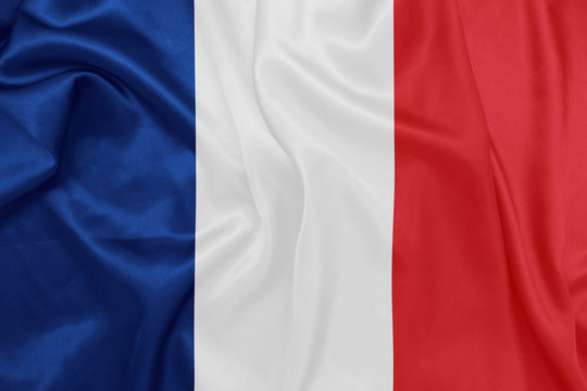 France - Waving national flag on silk texture