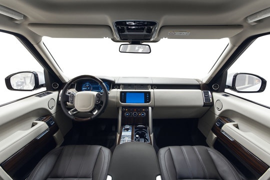 Car interior white dashboard and brown seats