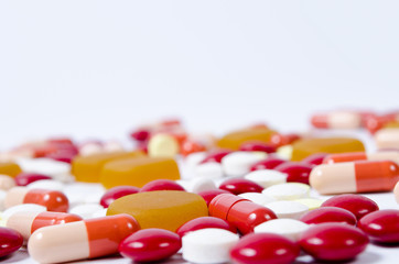 Many colorful pills isolated on white © rbadowski