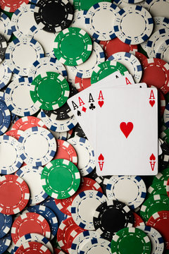 four of a kind poker hand Aces and chips
