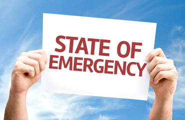 State of Emergency card with sky background