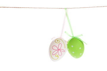 Colorful easter eggs hanging on rope