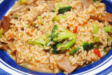 Beef and Broccoli Served on a Plate with Rice