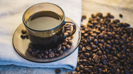 cup of coffee and coffee beans