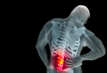 Human skeleton under the x-rays isolated on black background