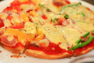 Italian pizza ham cheese and pepper