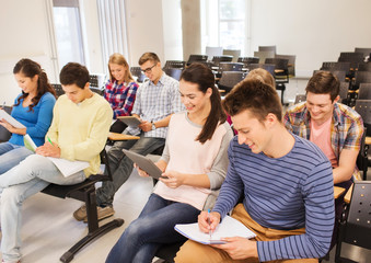 Fototapeta premium group of smiling students with tablet pc