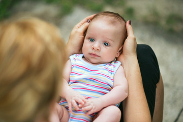 Mother and baby in the garden