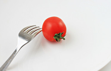 Fresh cherry tomato on plate