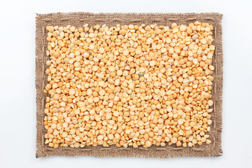 Frame of burlap and  pea seeds