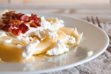 Pasta with cottage cheese, sour cram and bacon
