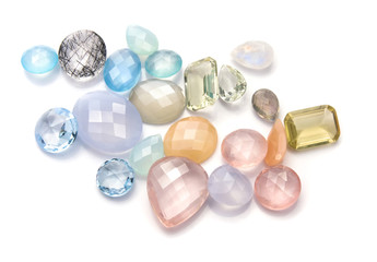 Pastel color gemstones collection on the white background.