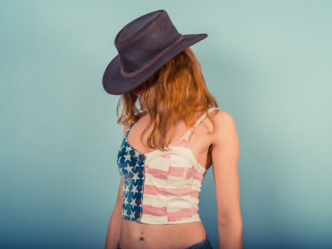 American woman with cowboy hat