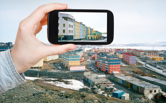 tourist taking photo of Anadyr town