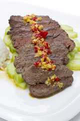 Sliced meal meat with red pepper garlic and cucumber