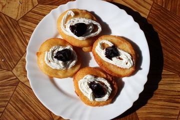 Pancakes with jam and whipped cream