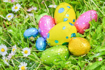 colorful Easter egg deposited on the prairie grass