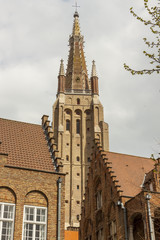Fototapeta na wymiar Bell tower of Our Lady Church in Brugge - Belgium.