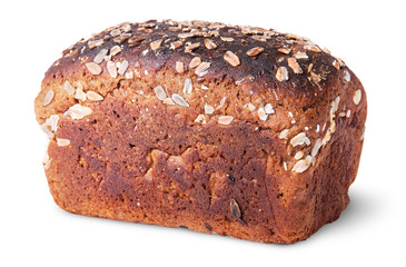 Unleavened black bread with seeds rotated top view