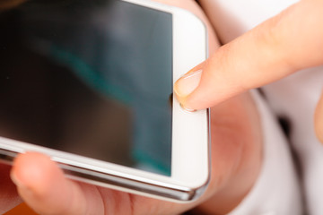 girl holding in hands mobile phone