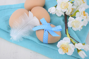 Easter blue and white table with fresh eggs