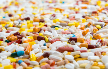 a lot of colorful pills