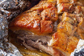 Tasty hot pork baked in aluminium foil