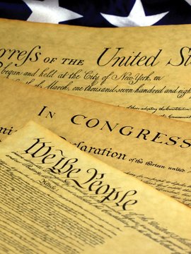 Historical Document US Constitution with America Flag