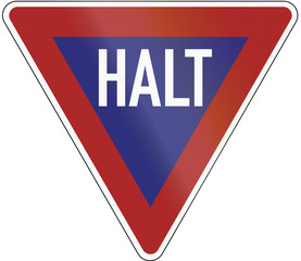 Old design (1956) of a German sign meaning: Stop! Give Way!