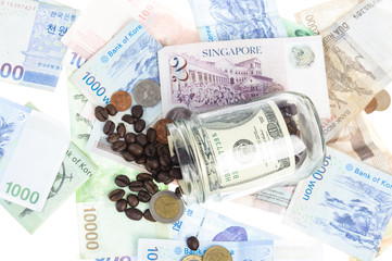 Coffee bean with Several kind of bank notes and coin