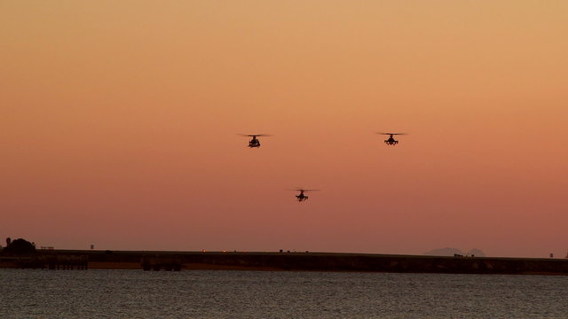 Helicopters returning back to base in the evening