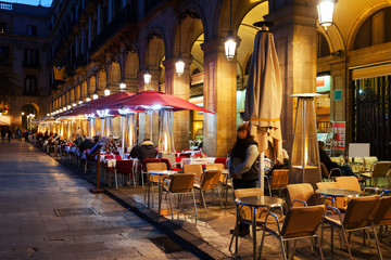 restaurants at Placa Reial in winter night. Barcelona