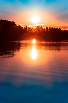 sunset over a lake in northern europe