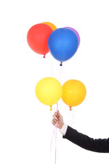 business hand with colorful balloons