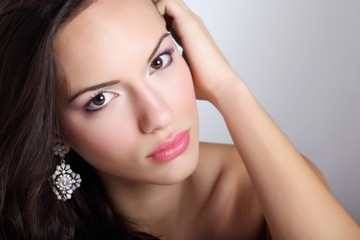 Portrait of young beautiful woman  with fashion makeup