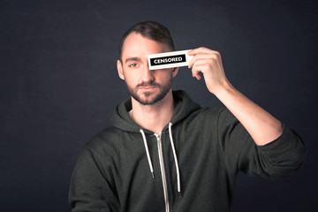 Funny guy with censored sign paper